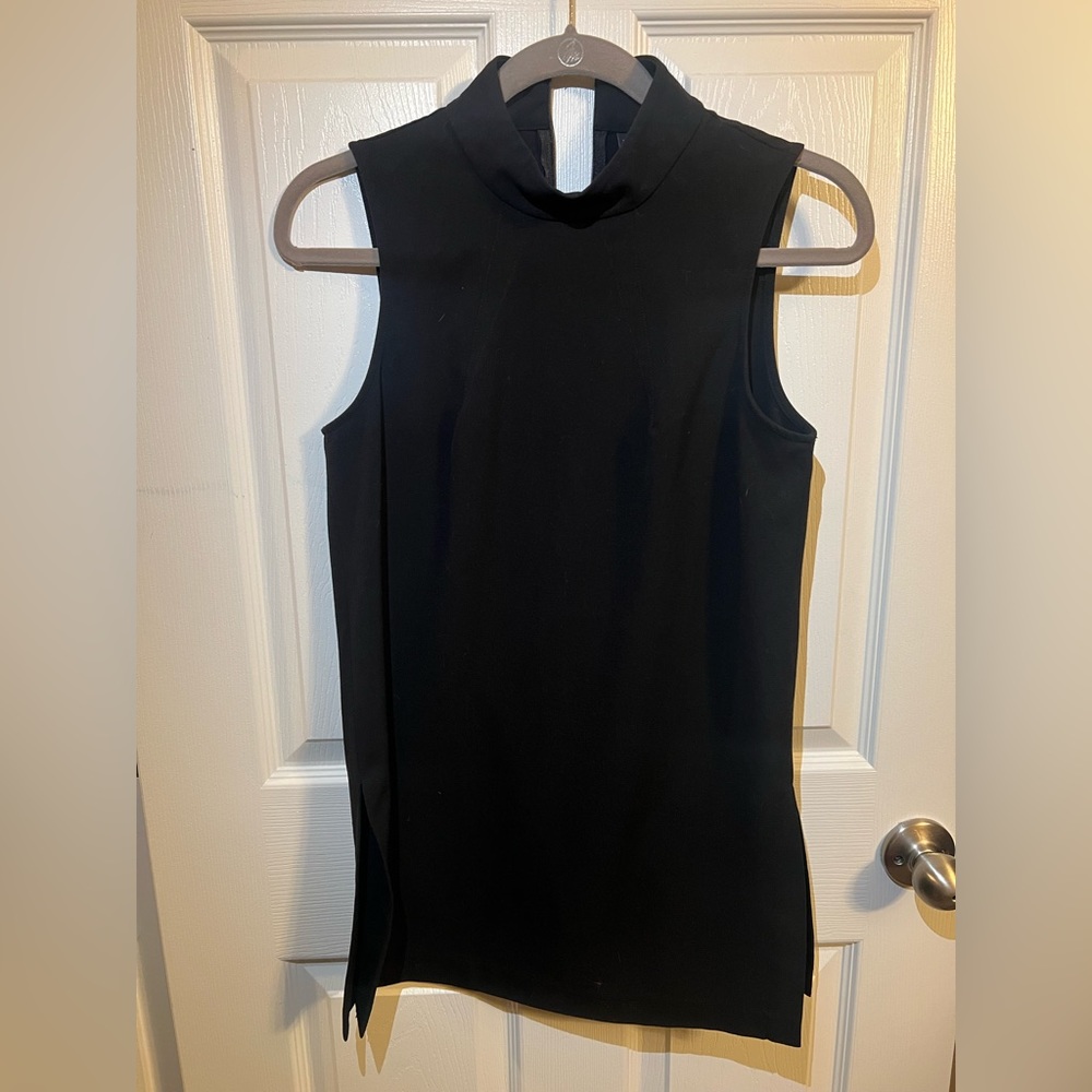 Black high neck sleeveless blouse with side slits
